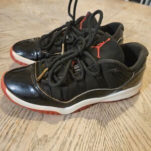 Nike Jordan 11 Retro Low Black and Red Trainers Size 2Y | Basketball